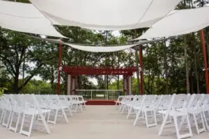 Entry view of Wedding venue decoration with white chairs
