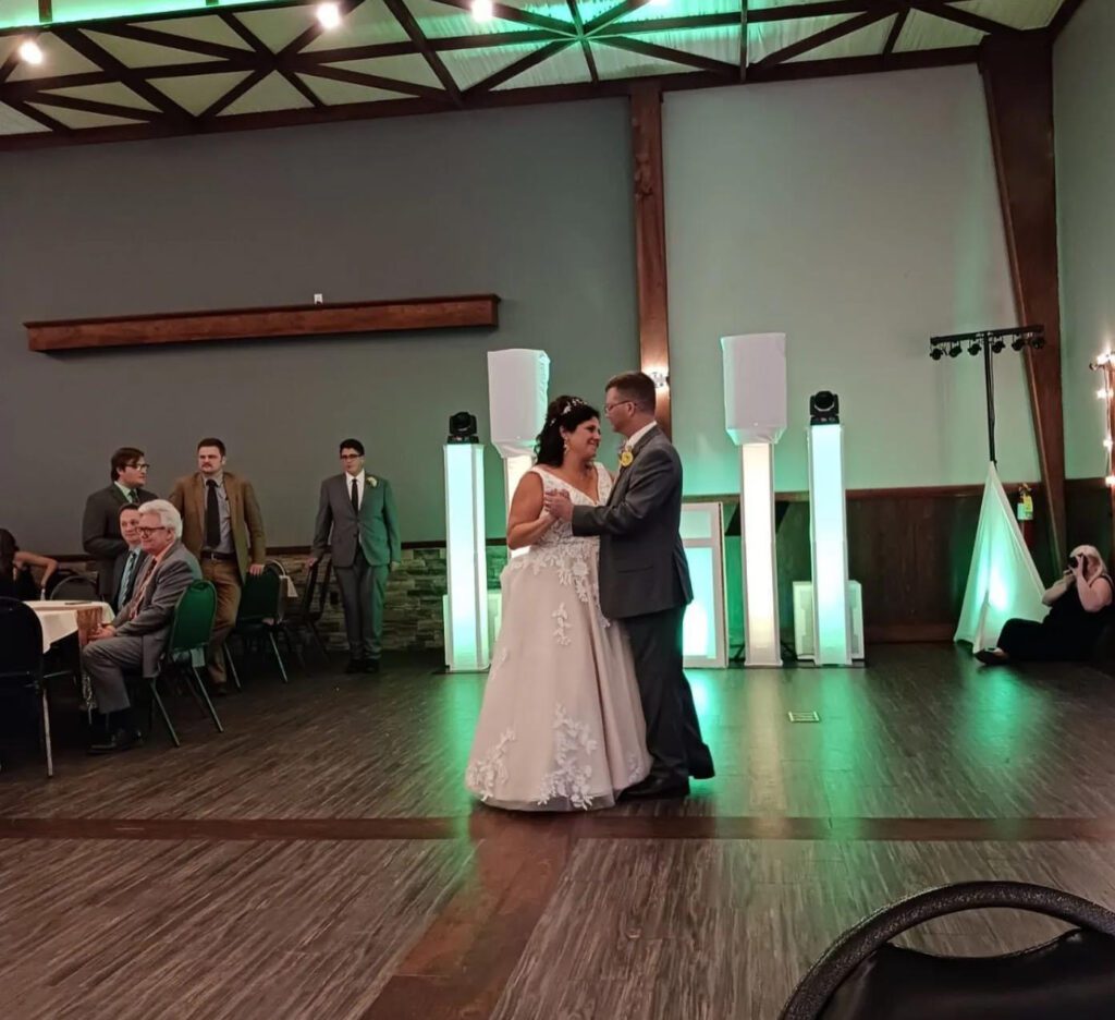 A couple is dancing on the dance floor