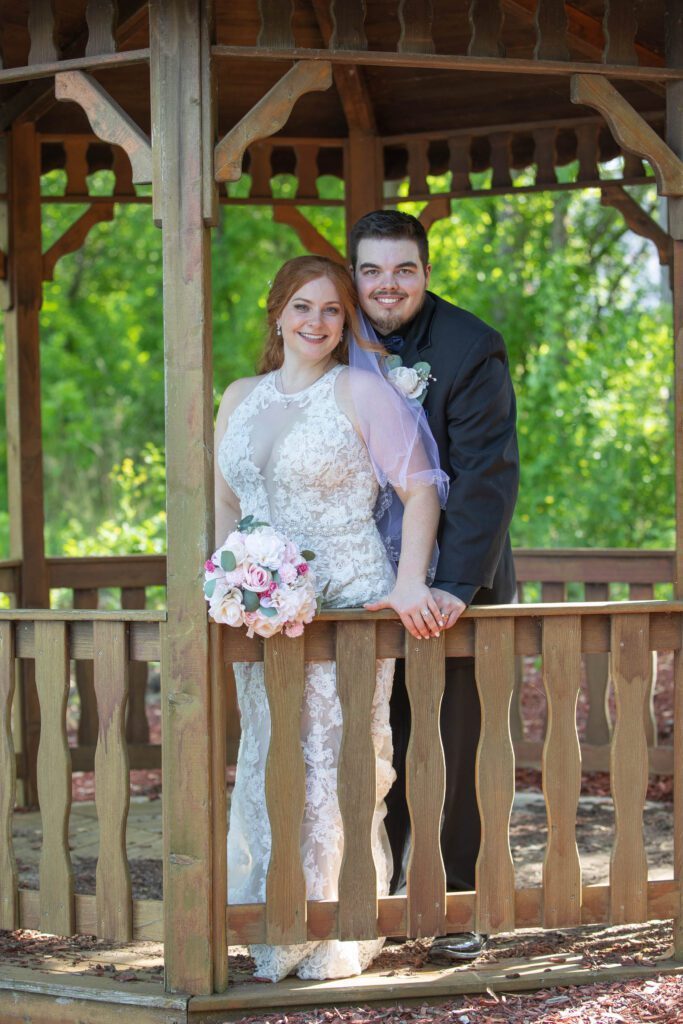 A man and woman posing for a picture.