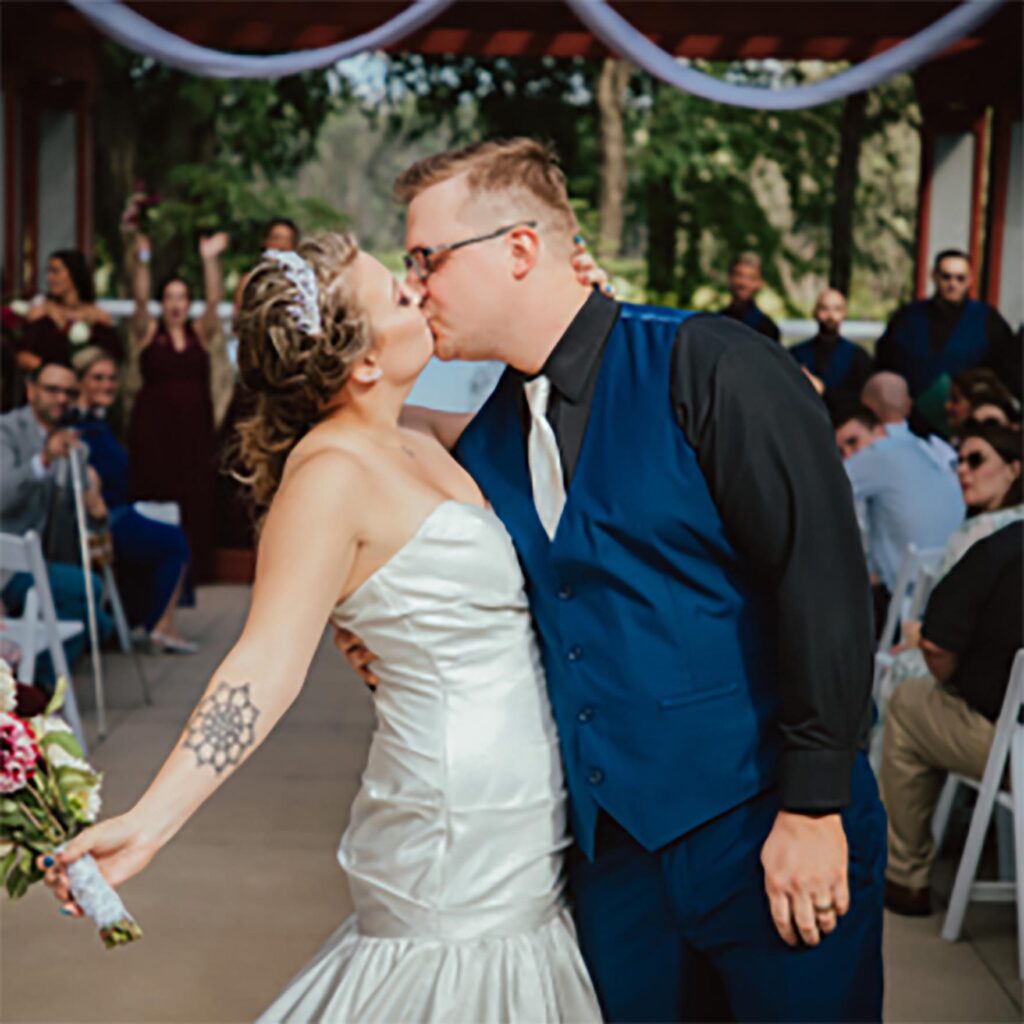 Wedding couple is having kiss to each other
