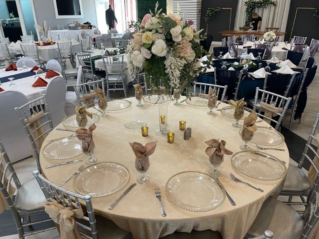 A table set up with plates and silverware.