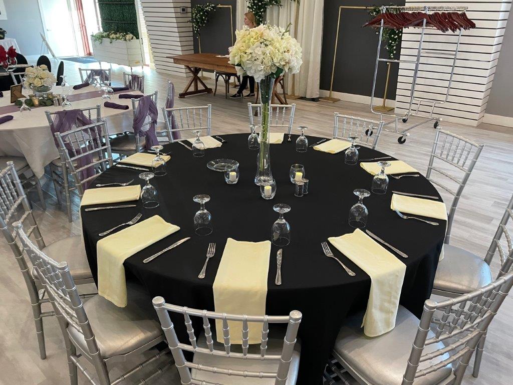 A table set up with chairs and tables