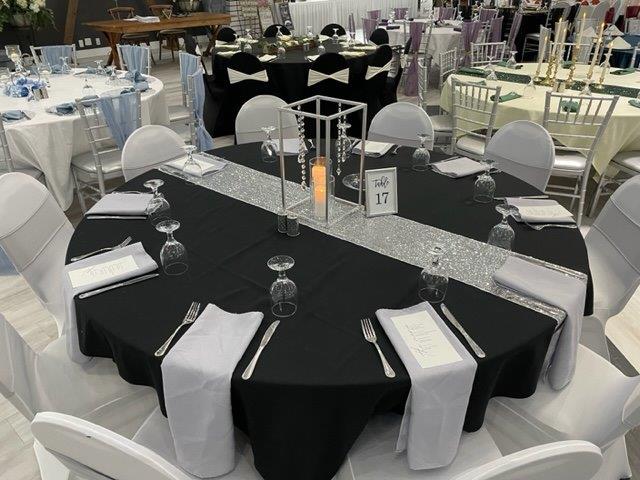 A round table with black and white tables in it